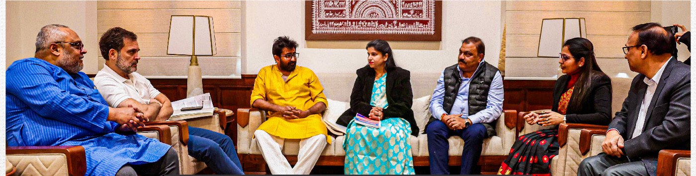 Rahul Gandhi seated with the All India Bank Officers Confederation delegation in a Parliament meeting room