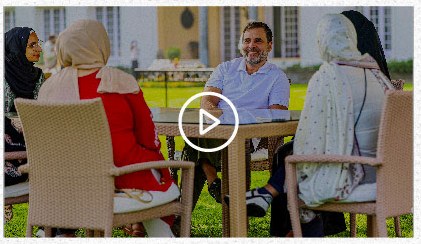 Video thumbnail: Rahul Gandhi seated outdoors with Kashmiri women students