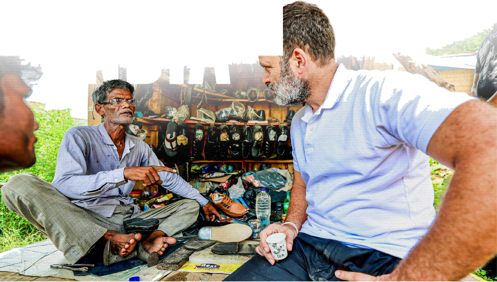 Rahul Gandhi sitting cross-legged with a cobbler in his roadside workshop, listening as the cobbler speaks