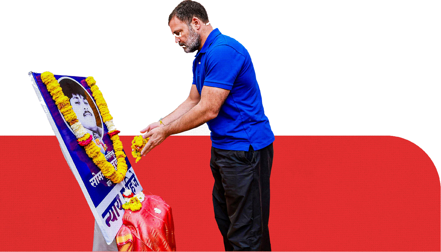 Rahul Gandhi in a blue shirt placing marigold flowers at a garlanded portrait of Somnath Suryavanshi, on a red band