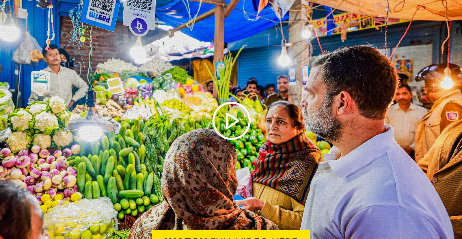 Video thumbnail: Rahul Gandhi at a vegetable market in Delhi, talking with shoppers among stalls of cauliflower, cucumbers and greens