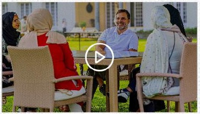Rahul Gandhi speaking with Kashmiri female students