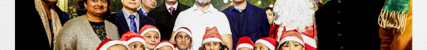 Rahul Gandhi and others celebrating Christmas with the Indian Christians Parliamentarians Council, some wearing Santa hats