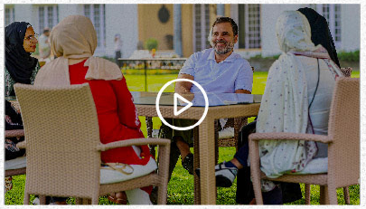 Rahul Gandhi speaking with Kashmiri female students
