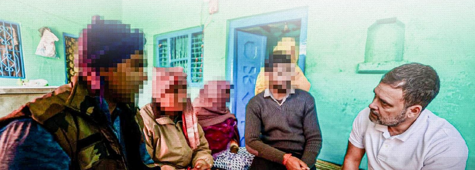 Rahul Gandhi seated and talking with a family in a modest interior; faces obscured for privacy